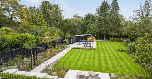 Garden designs using a garden room to create a modern landscaped