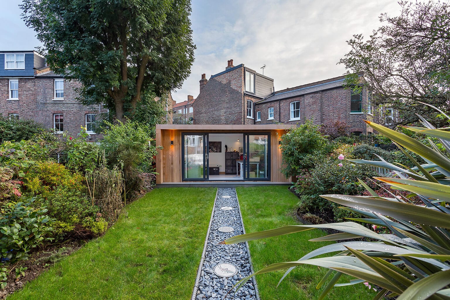 garden room with open doors being used as a home business